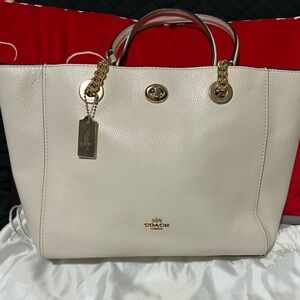 Sold Coach Turnlock Chain Tote in polished pebble leather in cream
